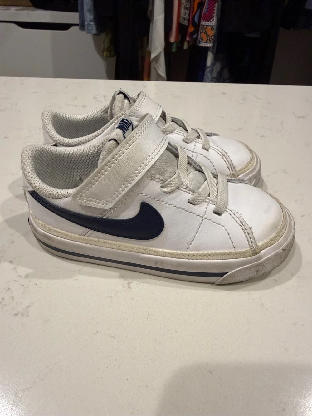 Nike Kids White Sneakers with Navy Swoosh and Velcro Strap